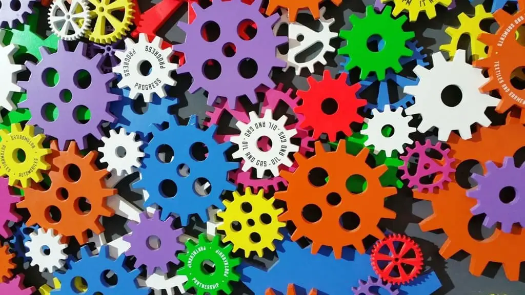 machine gear in different colors and sizes put together into an art